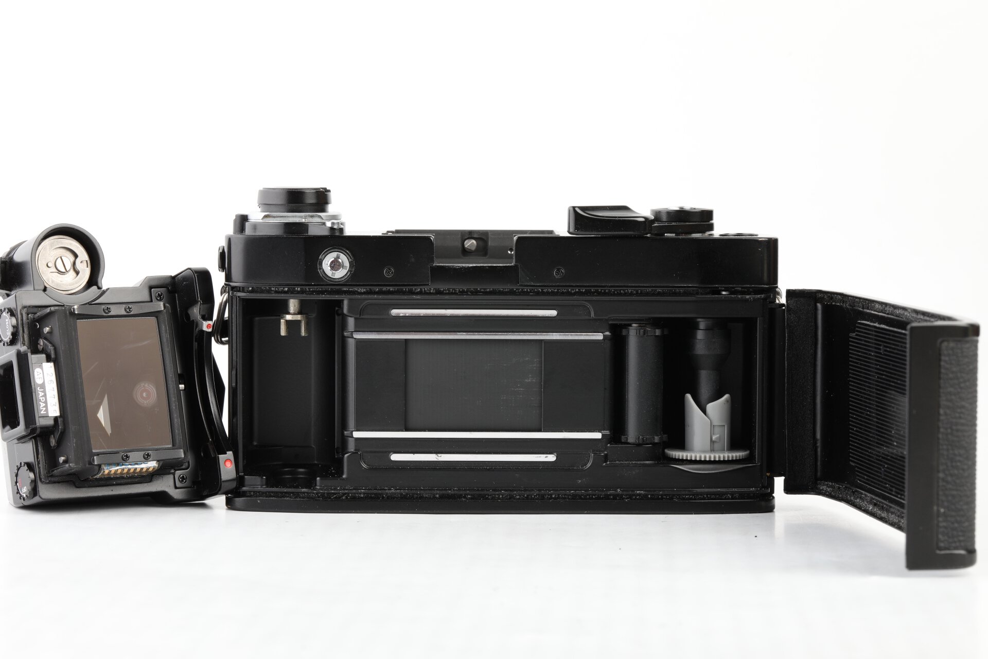 Minolta XM + MC Rokkor-PG 1,4/50mm + AE Prismensucher + Lichtschachtsucher + Winkelsucher