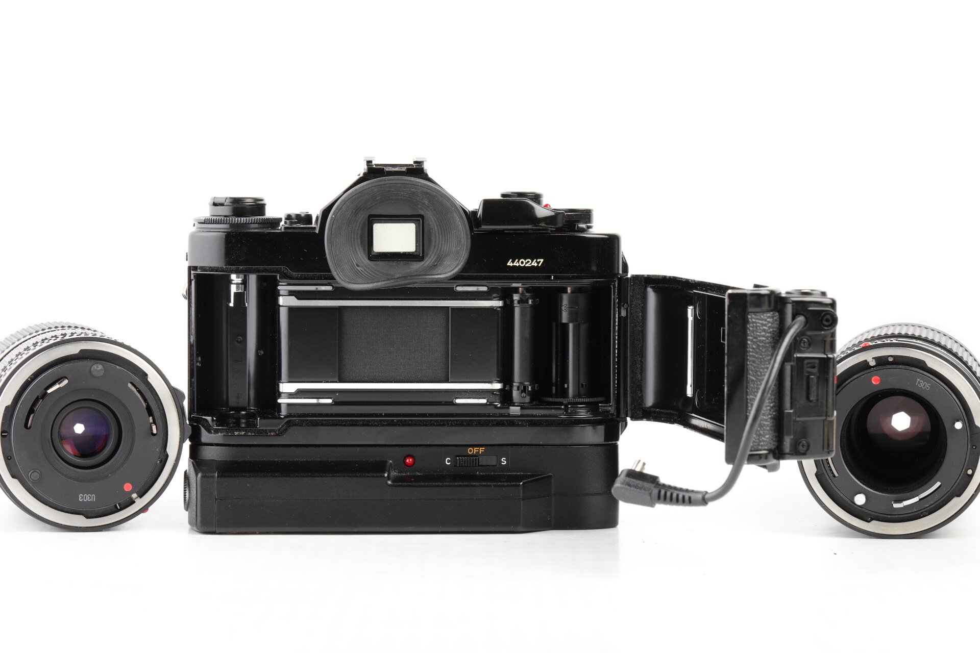 Canon A-1 +Power Winder A2 + FD 28mm f2,8 + FD 35-70 f4  + FD 70-150mm f4,5 + Data Back A