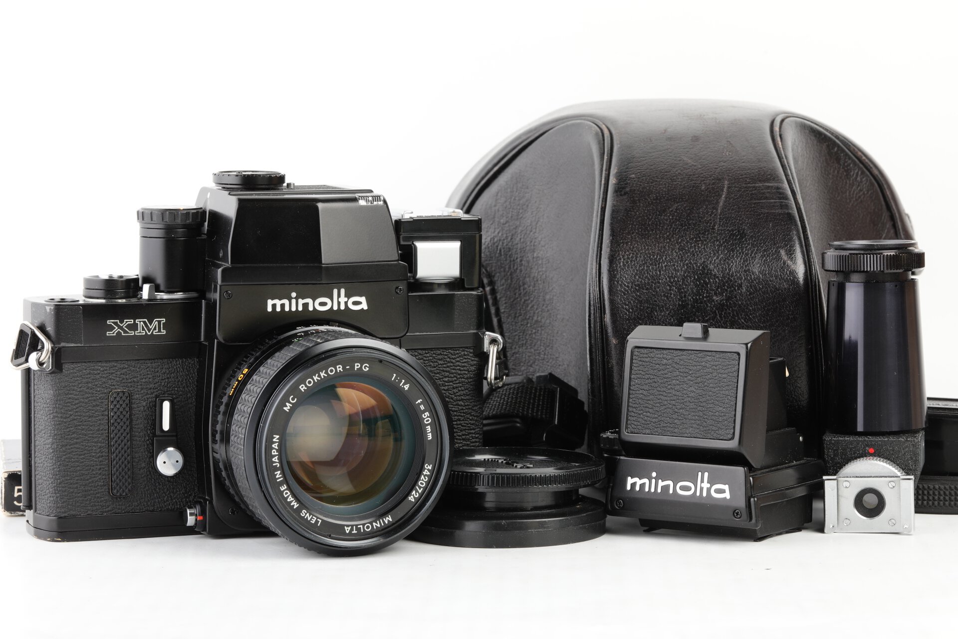 Minolta XM + MC Rokkor-PG 1,4/50mm + AE Prismensucher + Lichtschachtsucher + Winkelsucher